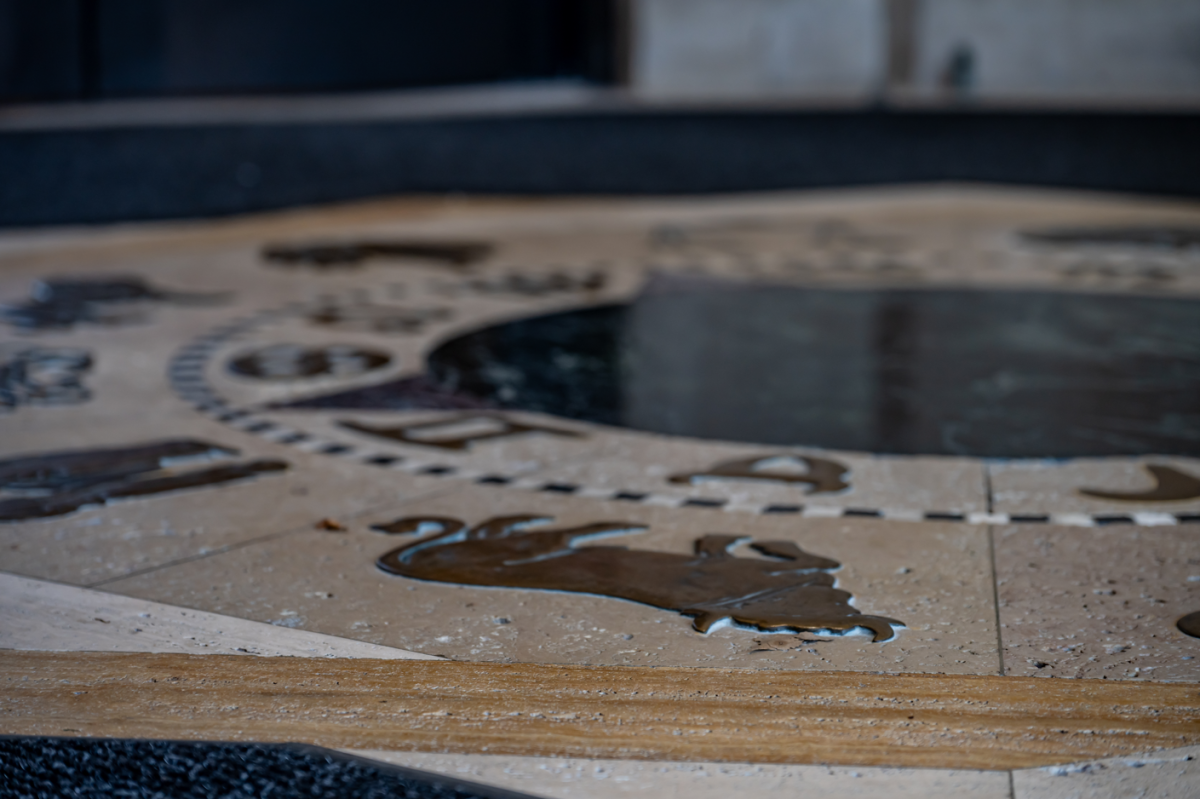 Photo of the medallion on the floor of the Memorial Union at Iowa State University