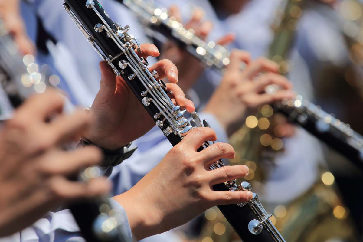 Photo of a line of students playing clarinet